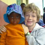 Swazi Children A young Swazi child with Luke VanderWal. By 2012, 20 percent of the Swazi population will be orphans under the age of 17.
