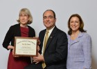 AAFP recognizes WSU Boonshoft School of Medicine with a Top Ten Award for working to meet the nation’s need for family physicians AAFP President Jeff Cain, M.D., presents the AAFP Top Ten Award to Amanda Bell, M.D., WSU associate professor of family medicine (left), and Dean Marjorie Bowman, M.D., M.P.A.