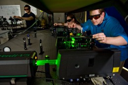 Students working with lasers in a Wright State physics lab.