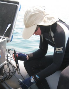Wright State Ph.D. student Brianne Kelly taking oxygen measurements at Lake Tanganyika in east Africa.