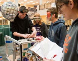 The "Mission Possible" event requires participants to link many simple machines together into a large, Rube Goldberg-like device designed to release a helium balloon bearing the team’s name.