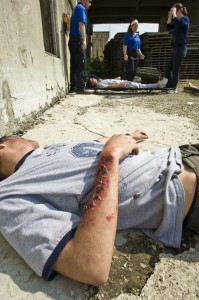 Photo of injured person in need of medical care during mass casualty exercise at Calamityville.