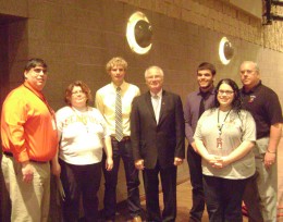 Photo of Wright State President David Hopkins posing for a picture with R.J, Chavez, Susan Keillor, Spencer Smith, J.C. Conley, Jeanne Scheuerman and Bill Dull at Elyria High School.