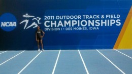 Photo of Cassandra Lloyd posing on a track at NCAA nationals.