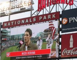 Photo of JumboTron at Washington National baseball game showing Wright State grad Nick Verina signing the national anthem.
