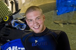 Photo of Wright State student intern Jon Nonnenmacher at the Newport Aquarium.