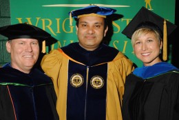 Photo of College of Engineering and Computer Science Dean S. Narayanan and recent Ph.D. graduates.