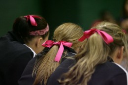 Photo of players wearing pink rbbons in their hair