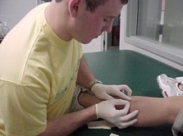 Photo of Wright State sports medicine student in action during the sports medicine workshop