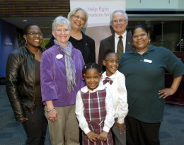 Photo of: Front row, left to right: Dawn Kilby (WSU 2004); Jacalyn “Jackie” Allen, director, Dayton Division March of Dimes; Daisha Dansby, daughter of Dawn Kilby; DeMarrione “Marri” Dansby, daughter of Dawn Kilby and ambassador, 2012 Miami Valley March for Babies; and Anna Kilby, mother of Dawn Kilby, grandmother of Daisha and Marri and Hangar employee. Back row: Jacqueline McMillan, vice president for enrollment management; and President David R. Hopkins.