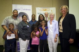 Photo of March for Babies Ambassador, DeMarrione “Marri” Dansby, her family, Wright State representatives, and Executive Director of the March of Dimes Dayton office Jacalyn Allen (right of Marri).
