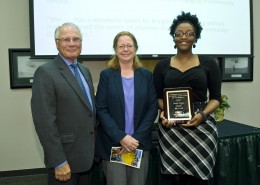 Amour Inman (right) received the Undergraduate Student Award. She is pictured with Wright State President David R. Hopkins and Marjorie McLellan, Ph.D., associate professor in Urban Affairs and Geography.