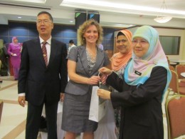 Photo of Sue Polanka, head of reference and instruction for the Wright State Libraries with a pair of Malaysian librarians.