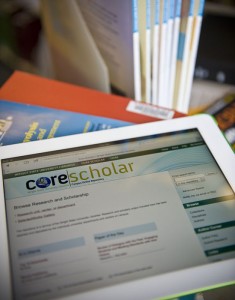 Photo of a tablet device with the CORE Scholar page displayed.