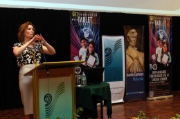 Photo of Sue Polanka giving a presentation in Malaysia.