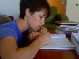 Photo of Lara Donnelly writing.