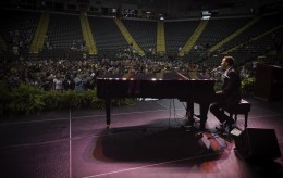 Photo of John Legend performing on stage at Wright State's Freshman Convocation 2012.