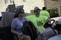Catching a ride on a golf cart is the way to go on Move-in Day.