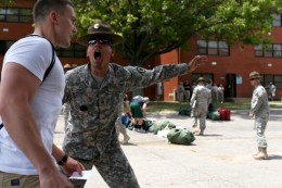 Photo of Derek Oda being instructed by a drill sergeant during his first day at the Leader’s Training Course.