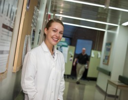 Photo of Wright State biology major Theresa Fennell outside the lab where she works