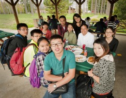 Photo of Chinese students at a picnic table