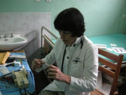 Photo of Dr. Sylvia Gleason making eyeglasses for people in the Democratic Republic of the Congo.