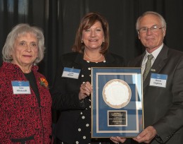 Photo of President Hopkins with two women.