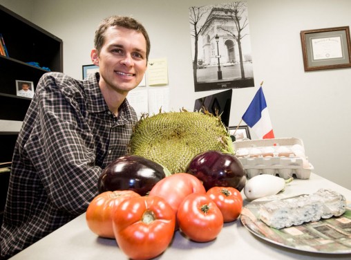 French instructor Benjamin Hirt shows off homemade cheese