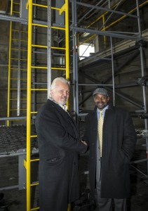 James Clark and Rufus Smith in front of scaffolding