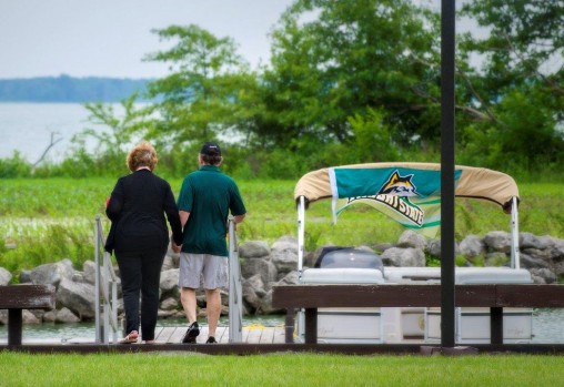 Bonnie and Bill Mathies walking on campus