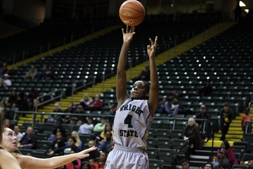 Kim Demmings shooting the baseline jumper on which she set the all-time scoring record.