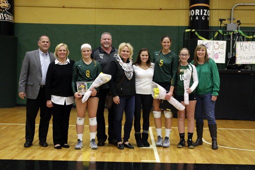 Leah Van Beveren and seniors Katie Glassmeyer and Marisa Aiello were honored at the women's volleyball team's senior night on Oct 17.