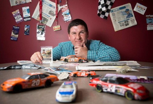 Greg Billing with toy racing cars 