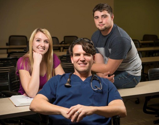 Kayla Crager and Kyle Hazlett, right, both major in biology and will attend medical school together next summer, while Mark Crager is working on his Post-Bac Certificate in Pre-Medical Studies.