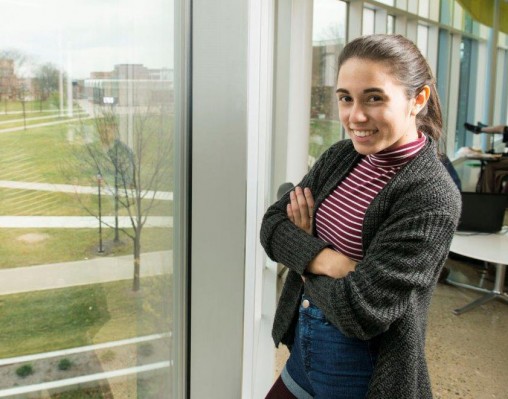 Gabriela Acevedo, a sophomore education major, shares her new-found writing skills with fellow students at Wright State's Writing Center. (Photos by Erin Pence)
