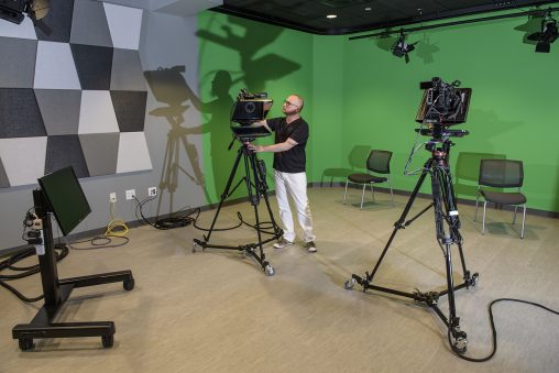 The New Media incubator features a working television and film studio with professional cameras and control room where students can manipulate and monitor studio events.