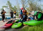 Photo of students and instructors preparing their kayaks for launch during Wright State University's Introduction to Kayaking class.