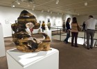 Photo of the 2011 Senior Show opening reception, sculpture by Nicholas Voegel.