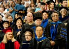 Photo of Wright State faculty in academic regalia at graduation.
