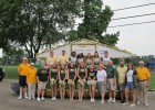Photo of Raiders posing for group picture at the Fairborn parade.