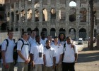 Photo of the Wright State Raider basketball team in Italy in front of the Roman Colosseum.