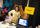 Photo of a woman at the Malaysia table at the 2010 International Friendship Affair