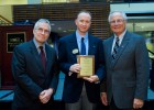 Photo of Bobby Rubin with President David R. Hopkins and Stephen Foster.