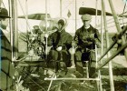 Wilbur Wright prepares to take his sister Katharine flying in Pau, France, in 1909.