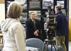 Photo of Edward Haas being interviewed by a local TV news crew about Pearl Harbor.