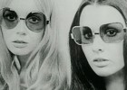 Photo of two women from the 1970s wearing sunglasses.