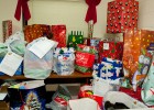 Photo of a large pile of donated toys and gifts.