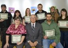 Photo of several of the contest winners and President David R. Hopkins as well as contest organizer Linda Ramey.