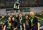 Photo of students holding a trophy