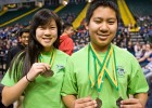 Photo of two students with medals